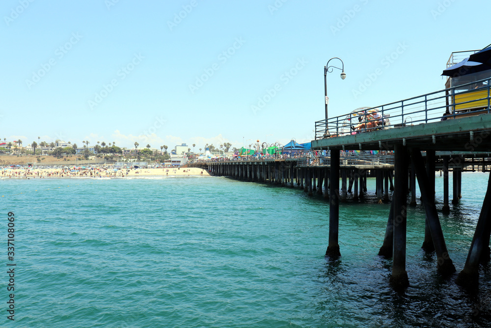 Santa Monica pier in California USA on blue Pacific Ocean