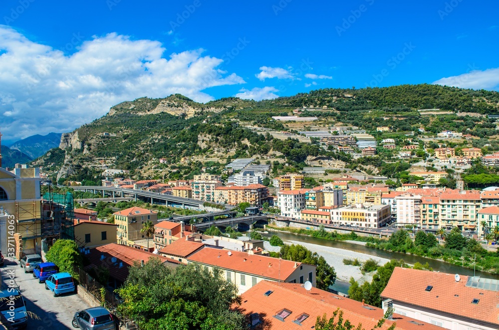 Ventimiglia town, Italy. View on the city, mountains with blue sky, italian riviera. Border with France, Cote de Azur
