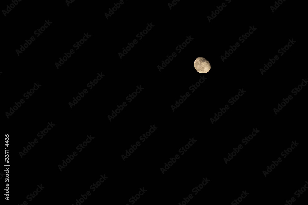 Beautiful view of small waning moon in cloudless sky at darkest night. Background, copy space, wallpaper. Idea concept Beautiful view of small waning moon in cloudless sky at darkest night. Background, copy space, wallpaper. Idea concept