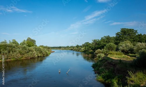 Wide river Klyazma in the middle of Russia in the hot summer.