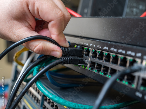 Plugging Network Cable into Networking Switch - Networking from Home