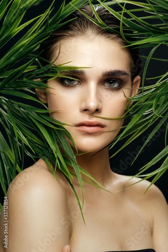 beautiful glamor woman green leaves cosmetics luxury