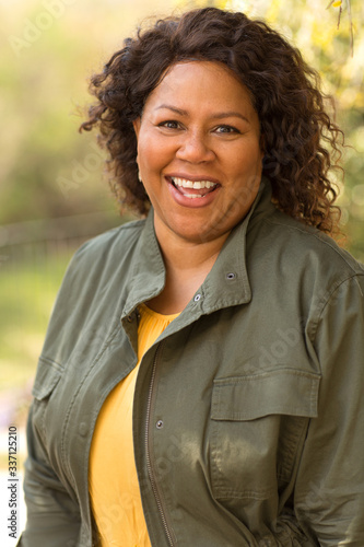 Beautiful mature African American woman smiling and laughing.