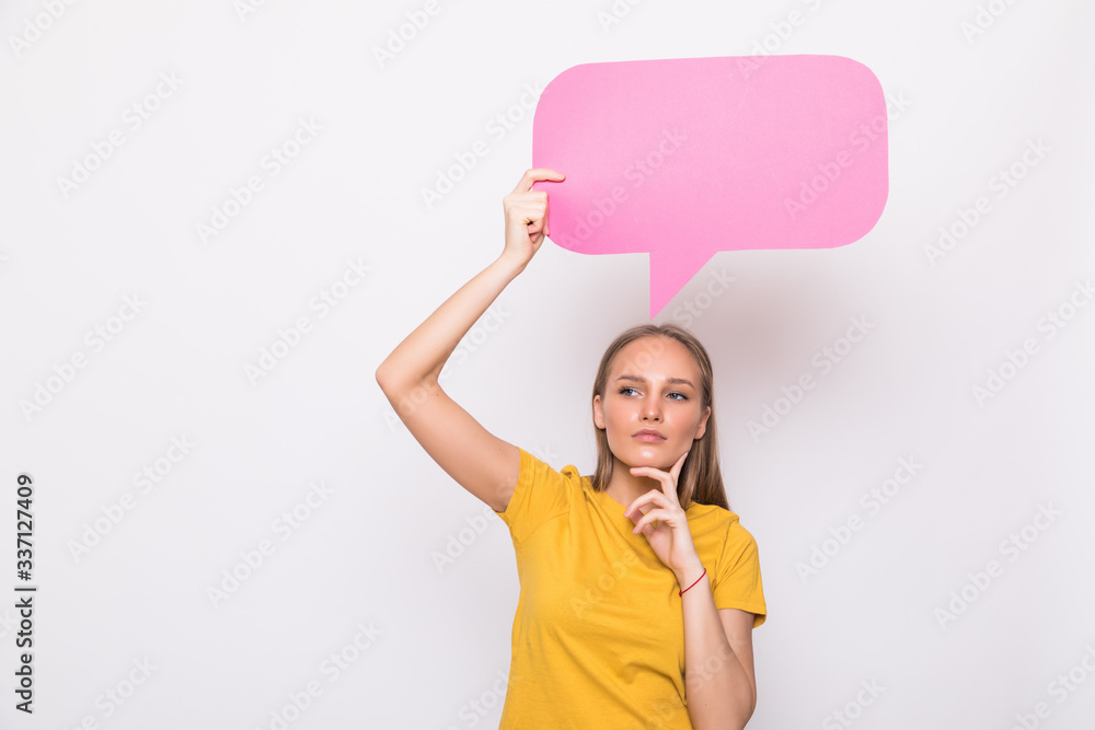 Young beautiful girl holding a pink bubble for text, isolated on a white background Young beautiful girl holding a pink bubble for text, isolated on a white background