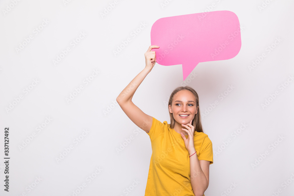 Young beautiful girl holding a pink bubble for text, isolated on a white background Young beautiful girl holding a pink bubble for text, isolated on a white background