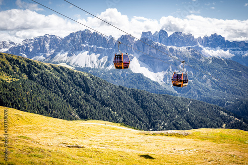 Two cable cars aerial lift tram South Tyrol mountains, Italy.