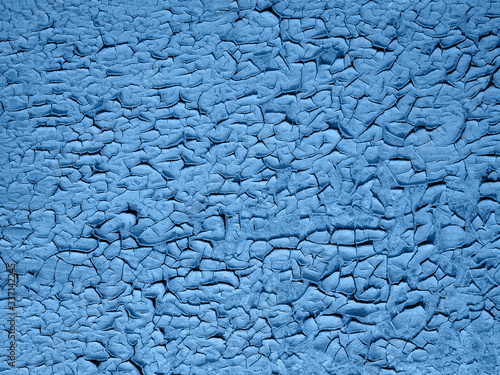 old peeling paint on wooden background. Classic blue color.