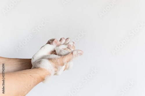 a man hands washing rubbing his hands with soap bubble cleaning hands wash off germs virus plain white background