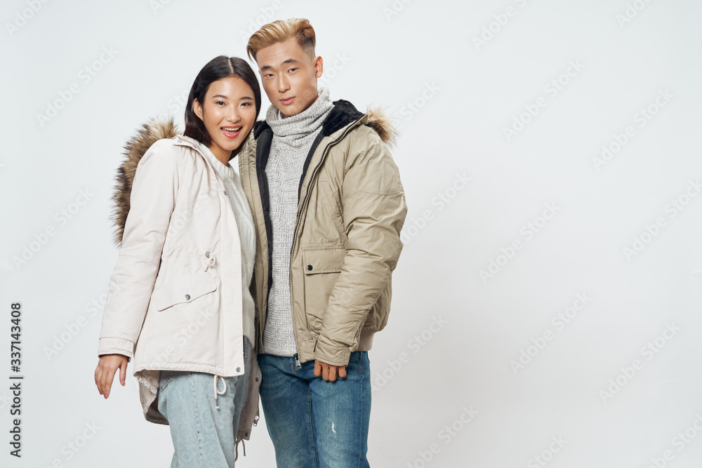 young couple in winter clothing young couple in winter clothing