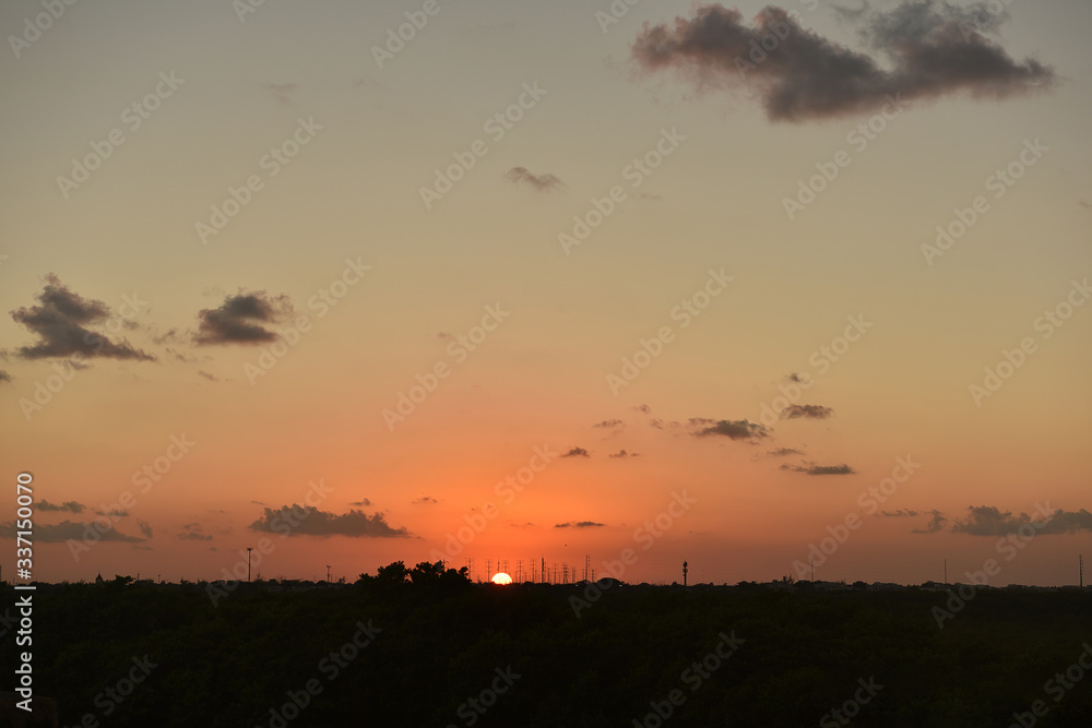 Photo of a beautiful sunset sky with clouds and different shades.