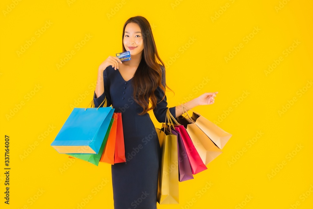 Portrait beautiful young asian woman with shopping bag