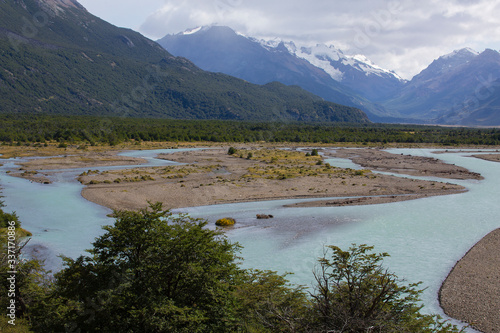 View of De las Vueltas River Valley and the town of El Chalten, Argentina. The turquoise water color is caused by glacial silt. photo