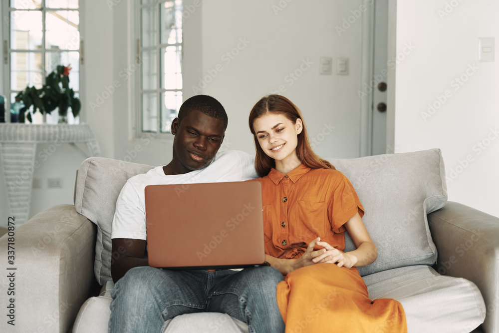 couple using a laptop couple using a laptop