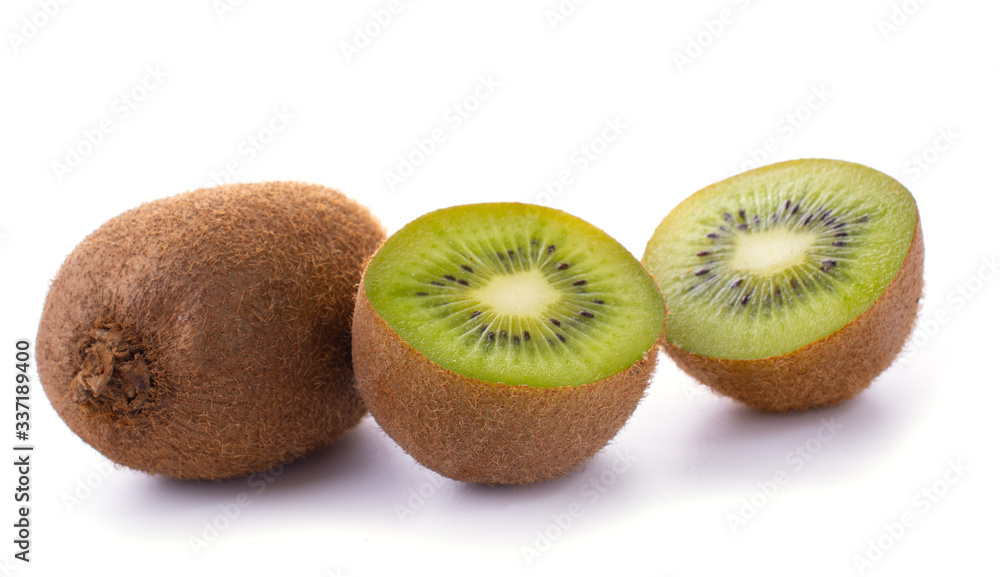 Kiwi fruit with pieces isolated on a white background, close-up. Kiwi fruit with pieces isolated on a white background, close-up.