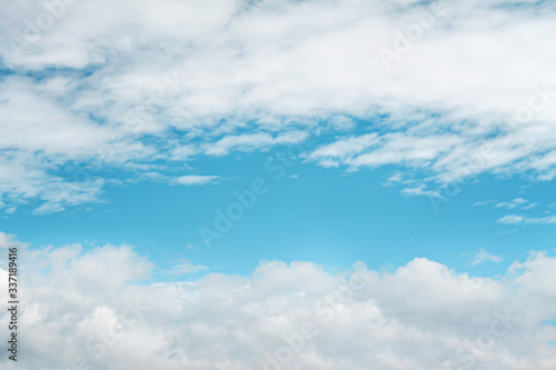 Clouds on bright blue sky background   copy space