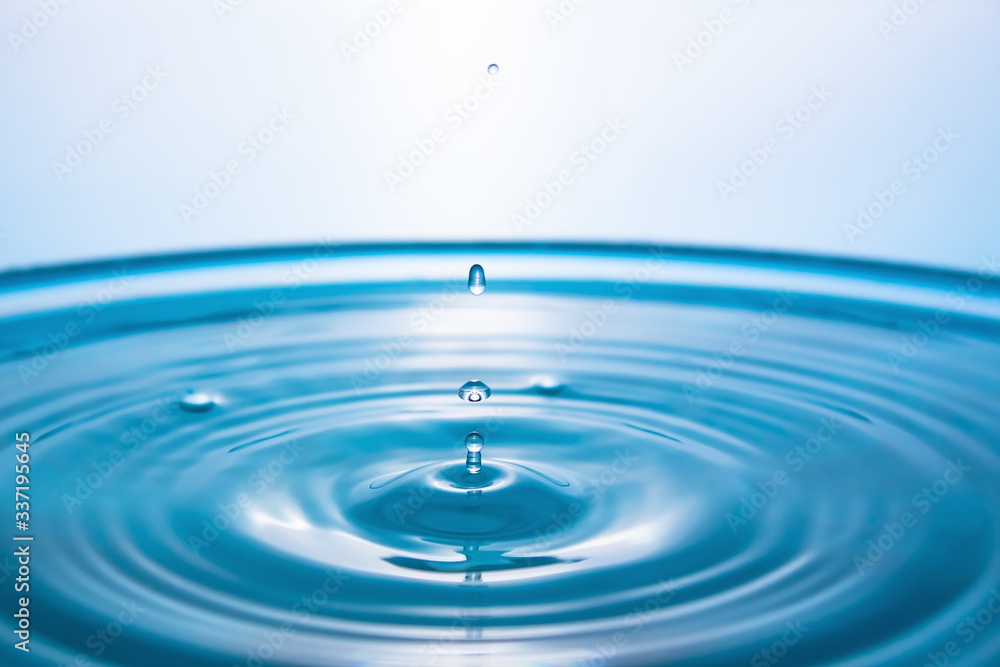Abstract an outbreak of water. Splash of water close-up. Frozen water drop photographed at high speed.Slow dripping of liquid with air bubbles. Nature backgrounds or Wallpaper.Frozen liquid splashes Abstract an outbreak of water. Splash of water close-up. Frozen water drop photographed at high speed.Slow dripping of liquid with air bubbles. Nature backgrounds or Wallpaper.Frozen liquid splashes
