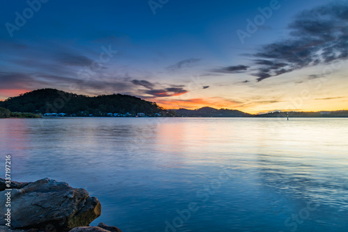 Sunrise Waterscape over the Bay with High Clouds