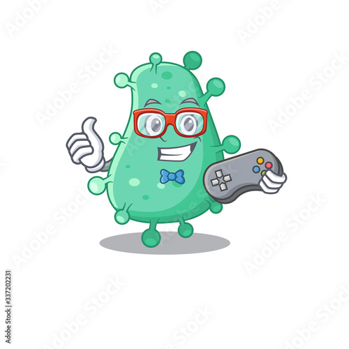 Mascot design concept of agrobacterium tumefaciens gamer using controller photo