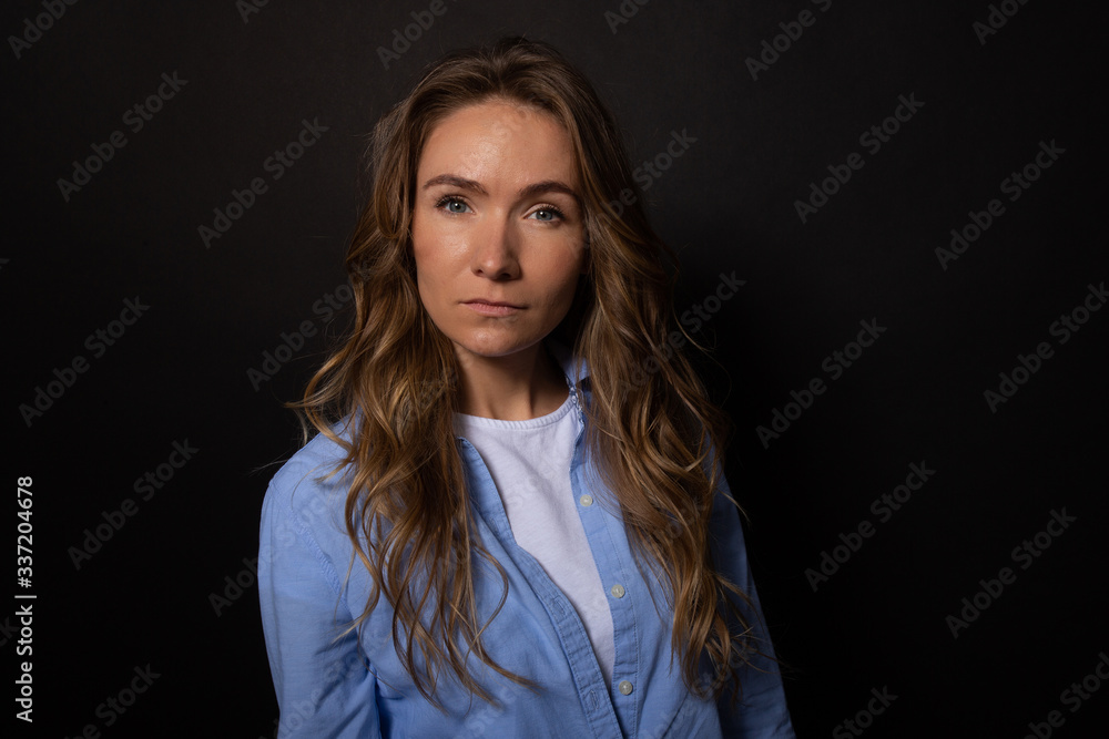 Attractive woman looking seriously, confidently at camera. Own business keeper Attractive woman looking seriously, confidently at camera. Own business keeper