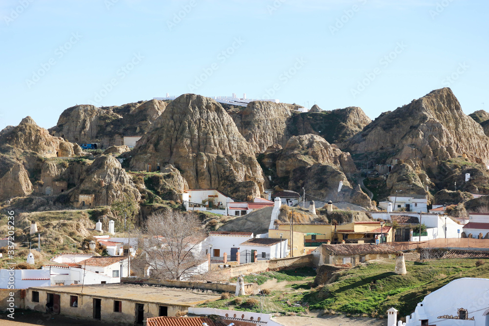 Aerial view to unique spanish town Guadix with famous troglodyte cave dwellers, Granada, Spain