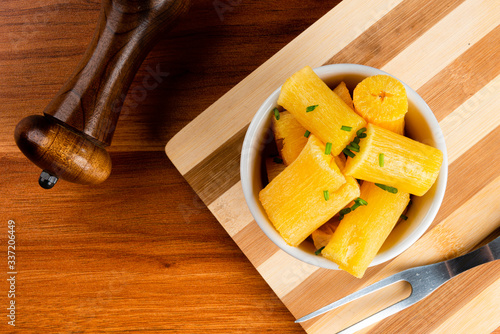 Brazilian food mandioca frita. Deep fried cassava root. photo