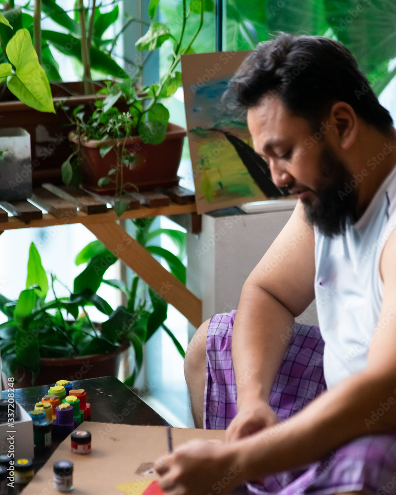 art, creativity and people concept - artist painting at home. art, creativity and people concept - artist painting at home.