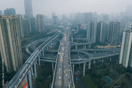 Aerial drone shot of flyover highway to E'GongYan Bridge in Chongqing, China photo