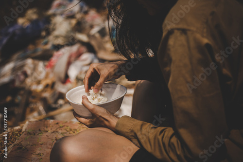 poor people or beggar begging you for help sitting at dirty slum Fototapet