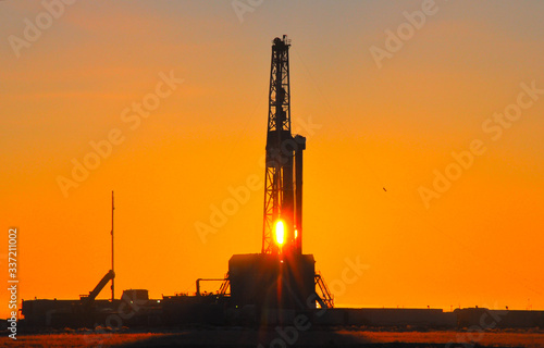 The drilling rig during sunset