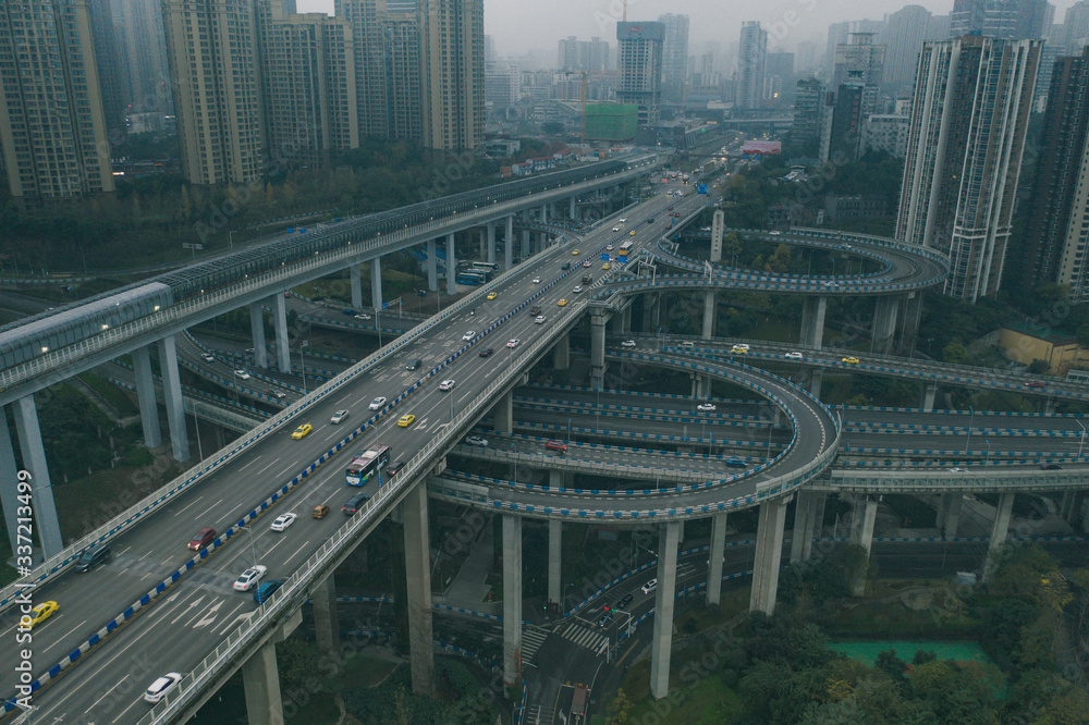 Aerial drone shot of flyover highway to E'GongYan Bridge in Chongqing, China