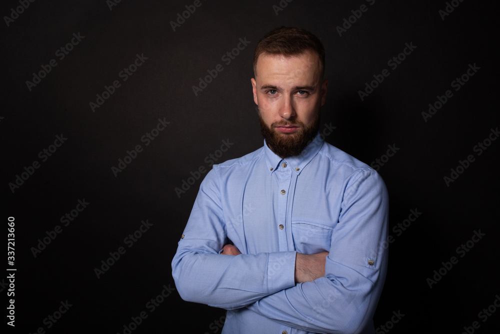 Handsomeman looking seriously and confidently at camera. Business portrait Handsomeman looking seriously and confidently at camera. Business portrait