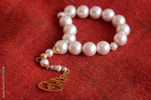 ornate white pearl rosary background