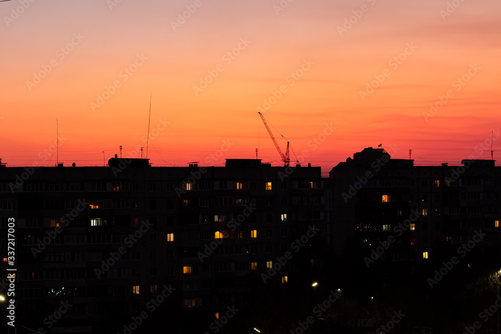 Sunset on the background of the city