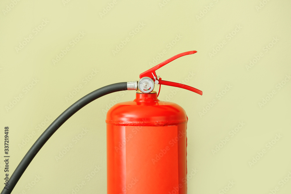 Fire extinguisher on color background Fire extinguisher on color background