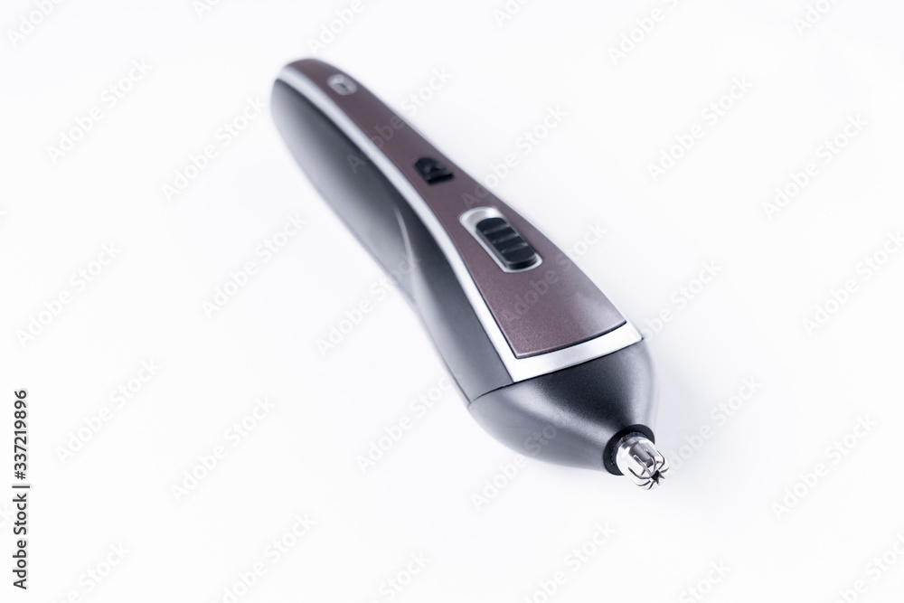 nose trimmer, on a white background, selective focus nose trimmer, on a white background, selective focus