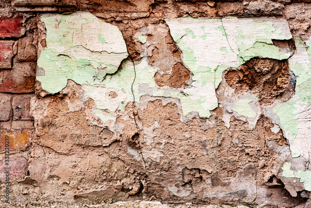 Fototapeta premium Texture of a concrete wall with cracks and scratches which can be used as a background