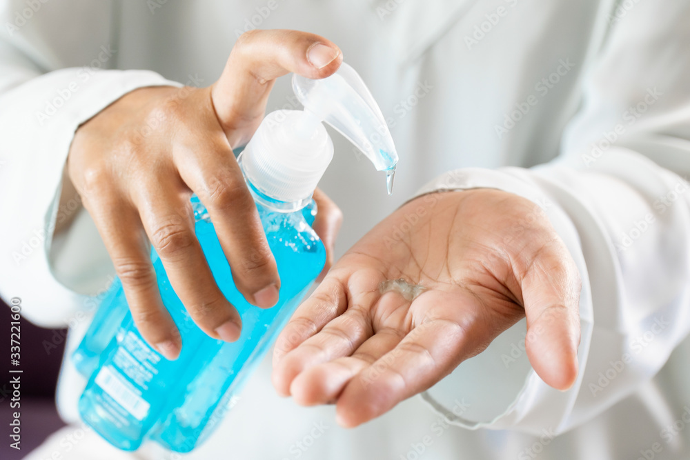 Hands sanitizer alcohol gel. Woman use for cleaning hands and protect from Corona Virus, COVID-19. Hands sanitizer alcohol gel. Woman use for cleaning hands and protect from Corona Virus, COVID-19.