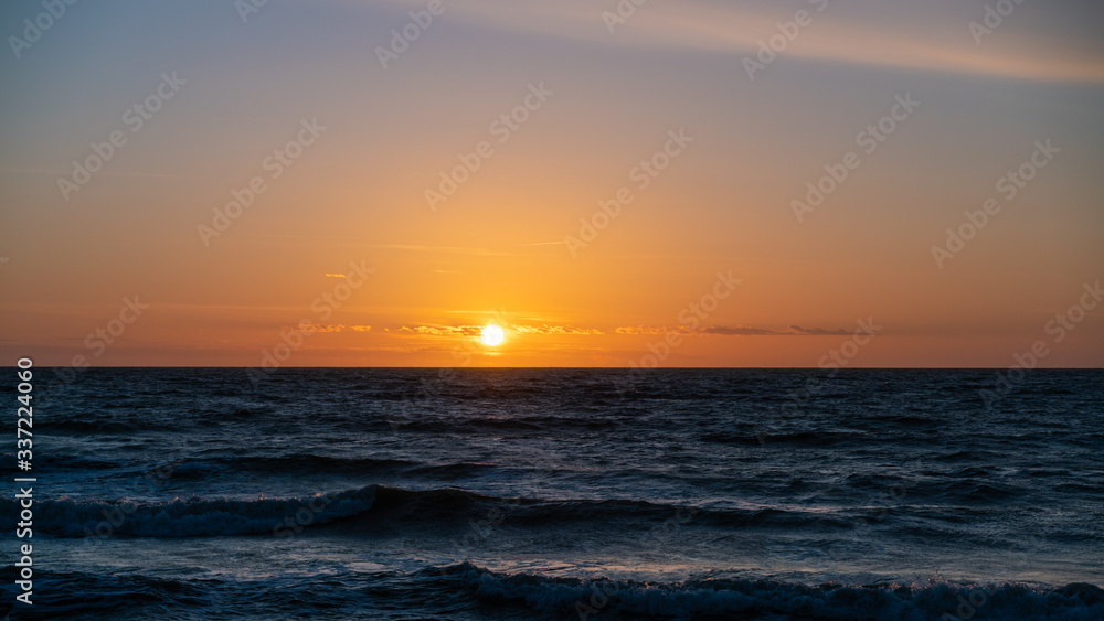 Panoramic view of a beautiful sunset over the sea.