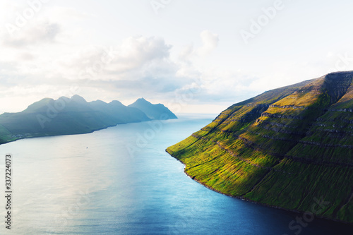 Picturesque sunset view from Klakkur peak near Klaksvik city on Kalsoy island, Faroe Islands, Denmark. Landscape photography photo