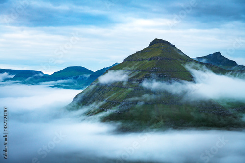 Majestic foggy views over the fjords of Funningur, Eysturoy island, Faroe Islands. Landscape photography © Ivan Kmit