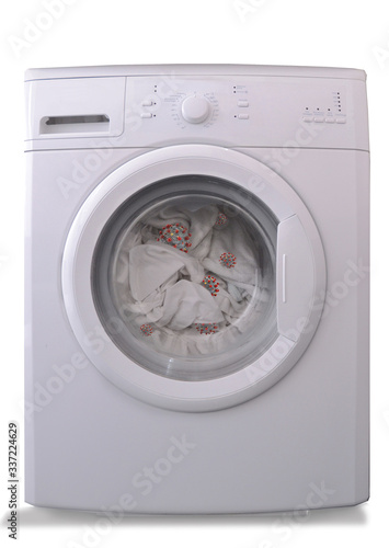 Front view from washer with infected virus clothes on white background.