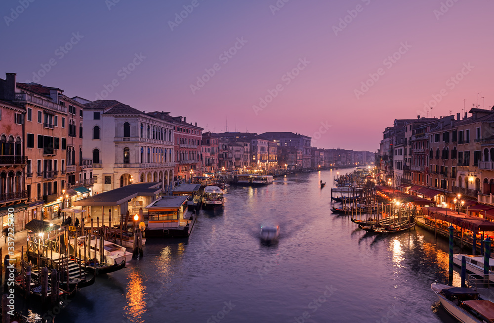 Panoramic view of the grand canal from Rialto Bridge during sunset