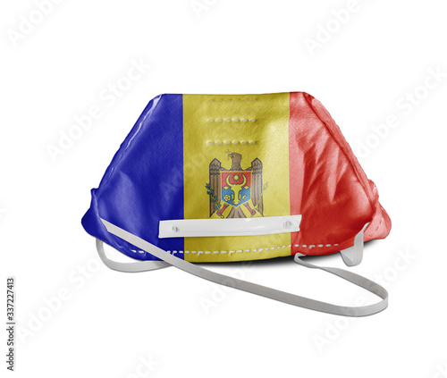 Moldova flag on white anti pollution mask for protection from virus photo