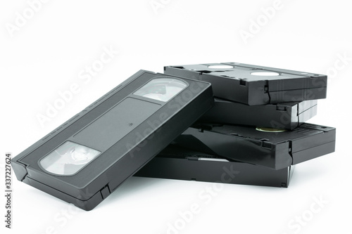 Stack of VHS video tape cassette isolated on white background.