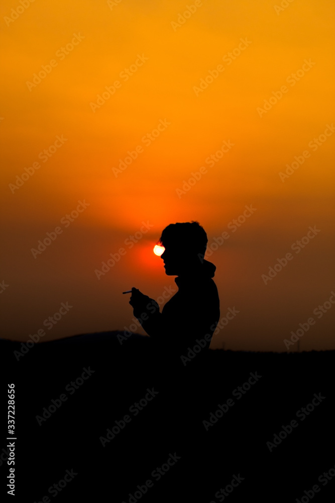 MAN IN THE SUNSET 