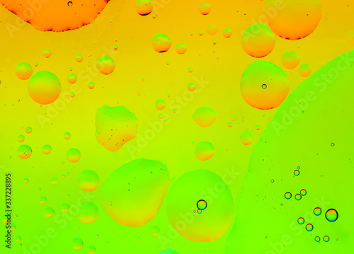 Abstract, image of oil, water and soap with colourful background photo