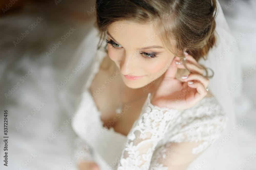 Portrait of a young beautiful bride shot from a high angle. Portrait of a young beautiful bride shot from a high angle.