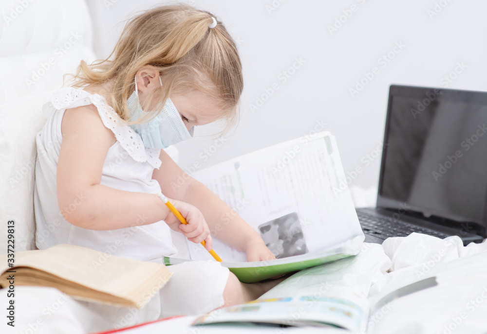 The child is studying at home, studying at home during quarantine, educational games for children, teaching gifted children, children of genius, masked child studying at home The child is studying at home, studying at home during quarantine, educational games for children, teaching gifted children, children of genius, masked child studying at home
