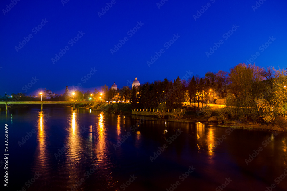 Night view of the embankment of the night city