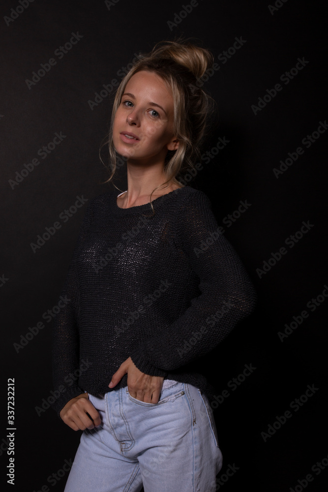Young woman posing for photoshoot. Smiles playfully. Portrait shoot Young woman posing for photoshoot. Smiles playfully. Portrait shoot